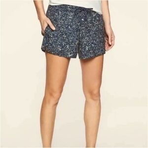 Athleta Baja shorts, front & back pockets, slit sides, size 4, EUC